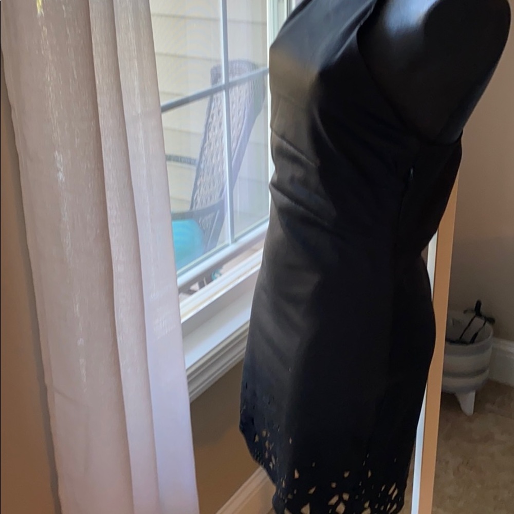 A black bodycon dress